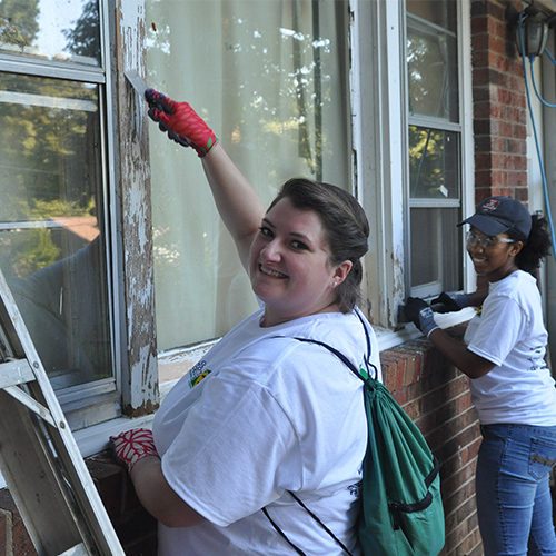 volunteers working on front repair